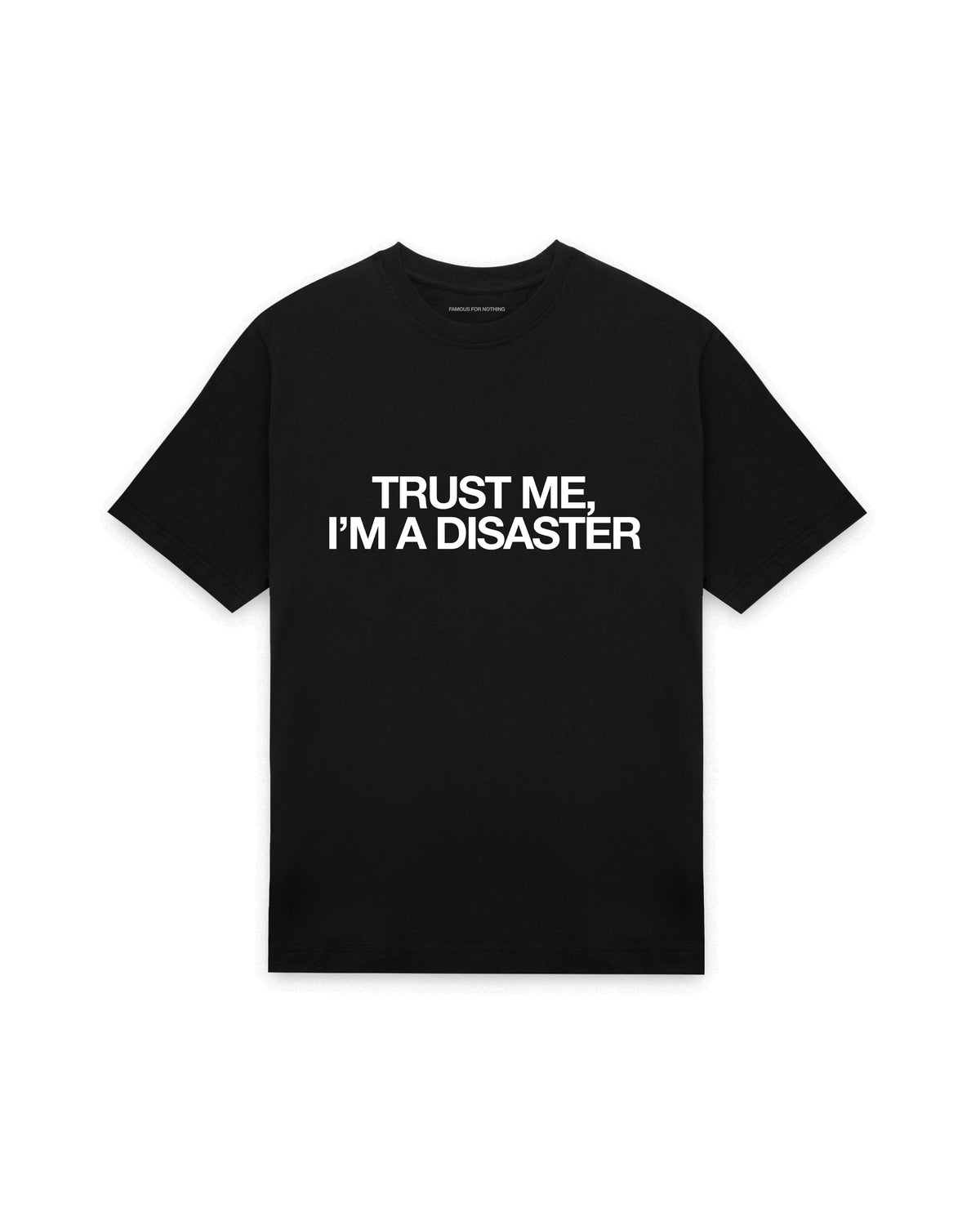 Black oversized t-shirt with TRUST ME I'M A DISASTER printed in Helvetica across the chest, AS Colour Heavy Tee 5080.