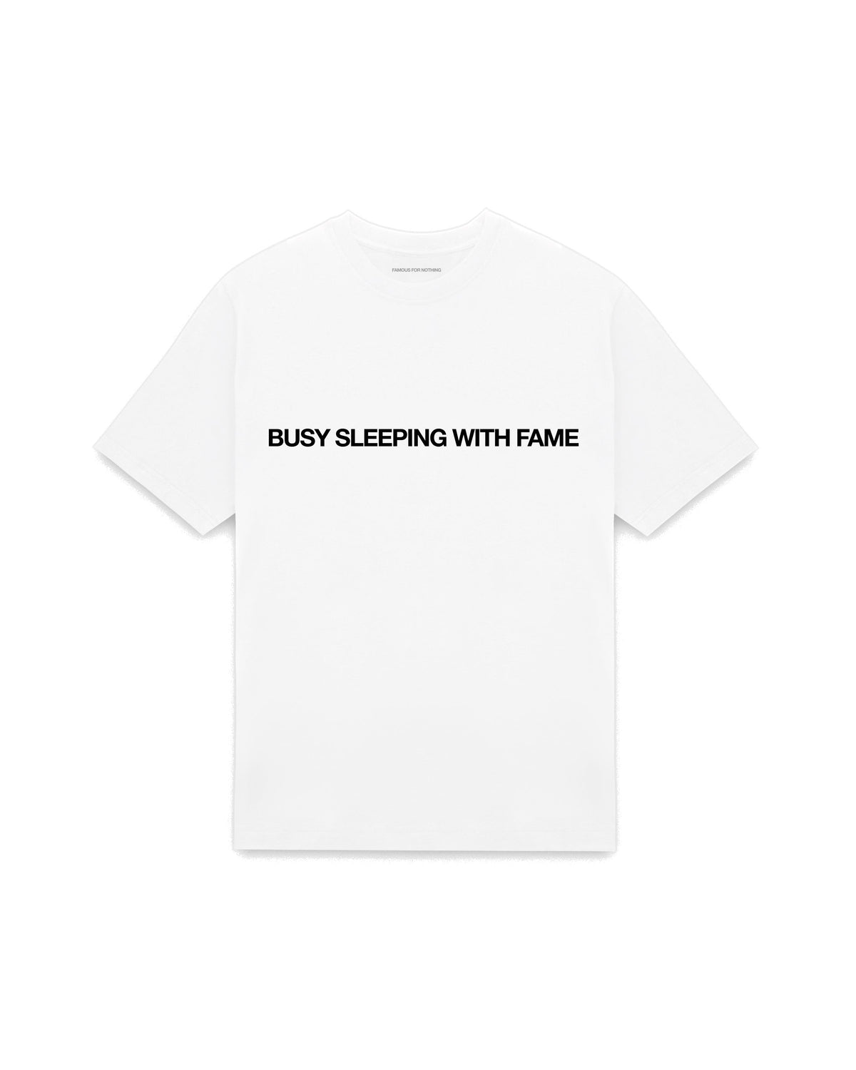White oversized t-shirt with BUSY SLEEPING WITH FAME printed in Helvetica across the chest, AS Colour Heavy Tee 5080.