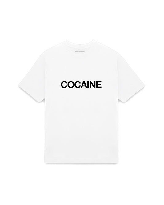 White oversized t-shirt with COCAINE printed in Helvetica across the chest, AS Colour Heavy Tee 5080.