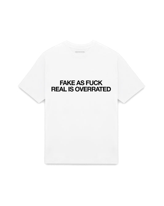 White oversized t-shirt with FAKE AS FUCK REAL IS OVERRATED printed in Helvetica across the chest, AS Colour Heavy Tee 5080.