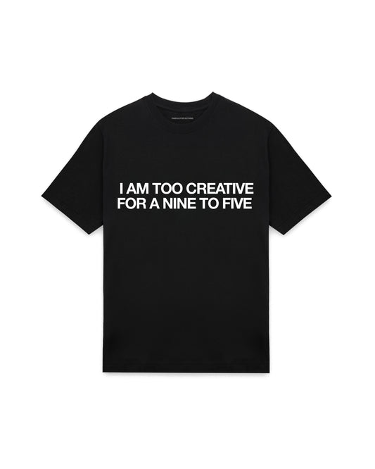 Black oversized t-shirt with I AM TOO CREATIVE FOR A NINE TO FIVE printed in Helvetica across the chest, AS Colour Heavy Tee 5080.