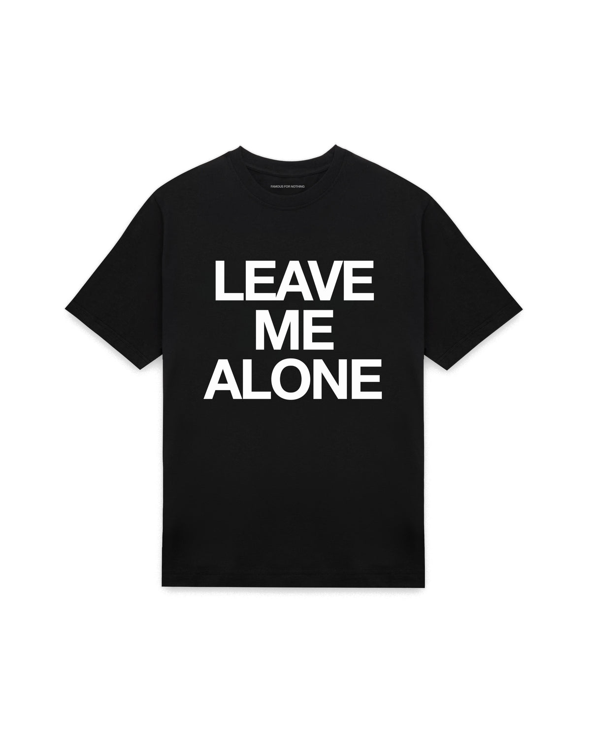 Black oversized t-shirt with LEAVE ME ALONE printed in Helvetica across the chest, AS Colour Heavy Tee 5080.