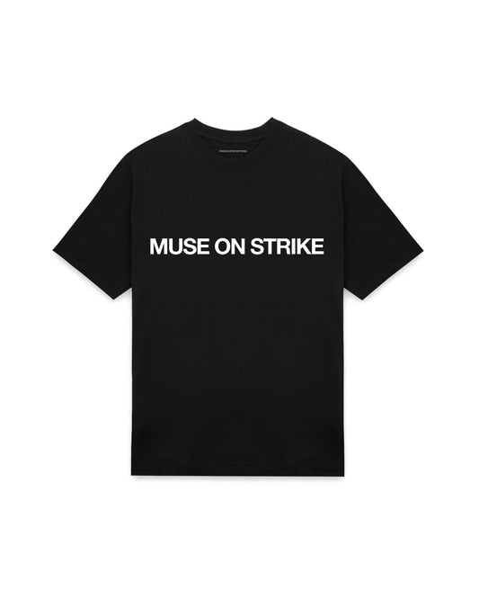 Black oversized t-shirt with MUSE ON STRIKE printed in Helvetica across the chest, AS Colour Heavy Tee 5080.