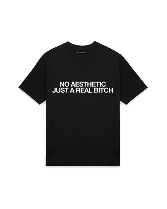 Black oversized t-shirt with NO AESTHETIC JUST A REAL BITCH printed in Helvetica across the chest, AS Colour Heavy Tee 5080.