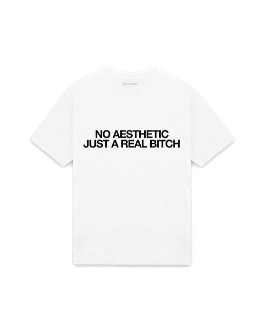White oversized t-shirt with NO AESTHETIC JUST A REAL BITCH printed in Helvetica across the chest, AS Colour Heavy Tee 5080.