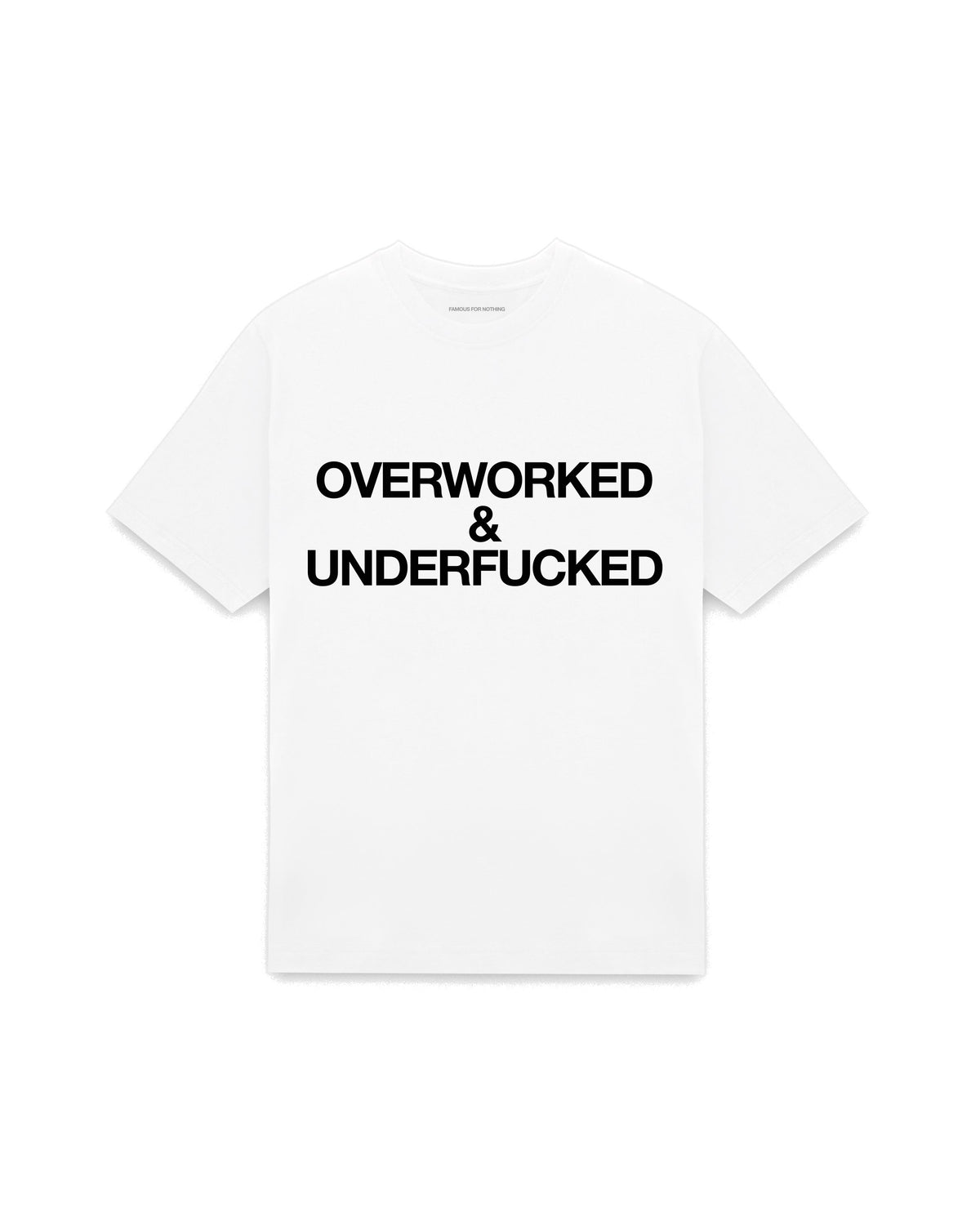White oversized t-shirt with OVERWORKED & UNDERFUCKED printed in Helvetica across the chest, AS Colour Heavy Tee 5080.