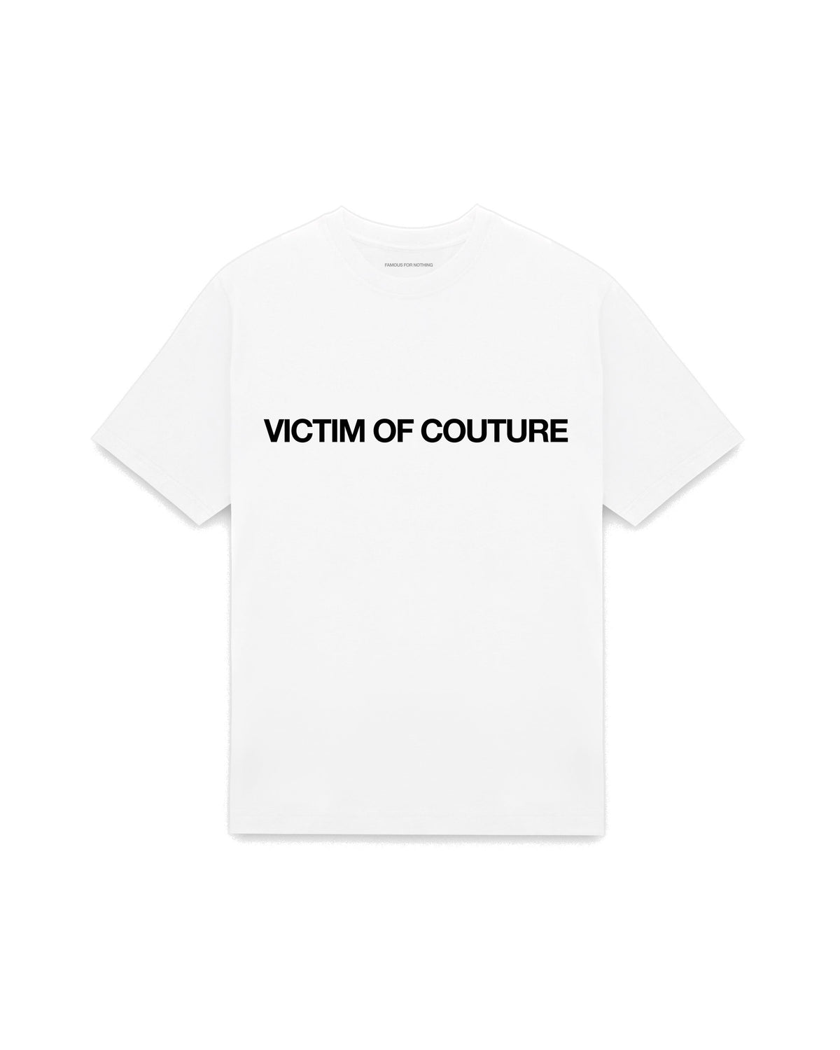 White oversized t-shirt with VICTIM OF COUTURE printed in Helvetica across the chest, AS Colour Heavy Tee 5080.