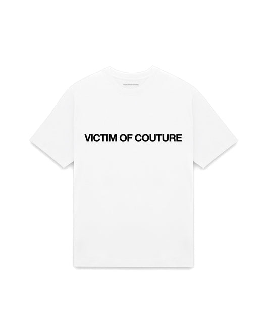 White oversized t-shirt with VICTIM OF COUTURE printed in Helvetica across the chest, AS Colour Heavy Tee 5080.